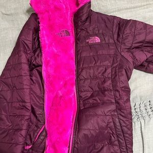 The North Face Pink double sided jacket! It has only been used twice.